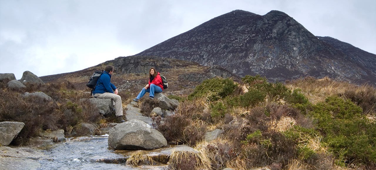 A couple hiking the Irish countryside